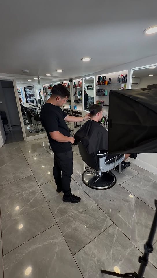 Infinity Media filming a content day at a barber shop